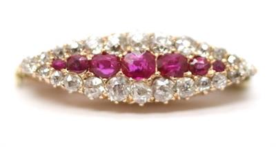 Zlatá brož s diamanty a rubíny