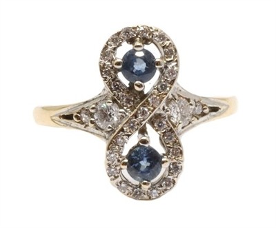 Zlatý prsten s diamanty a safíry