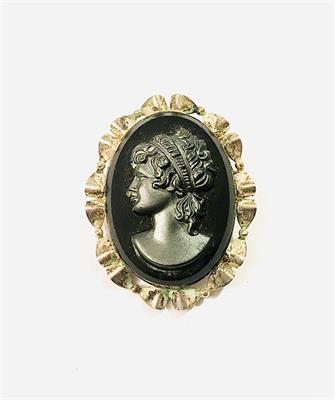 Stříbrná brož s portrétní černou kamejí