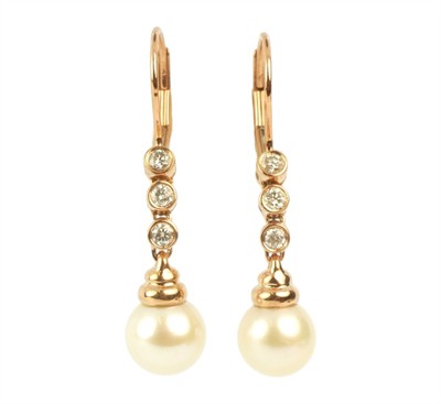 Zlaté náušnice s perlami a diamanty