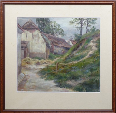 Domy u travnatého svahu