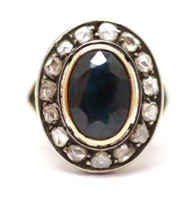 Zlatý prsten s diamanty a safírem