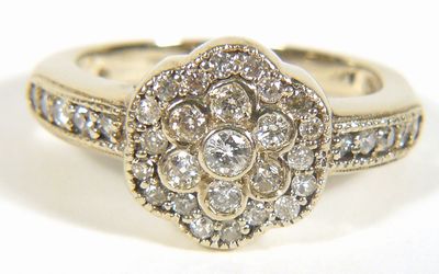 Zlatý prsten s brilianty 0,65 ct