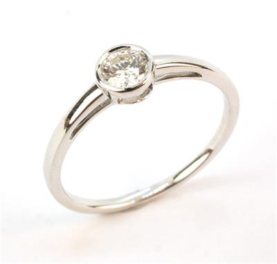 Zlatý prsten s briliantem