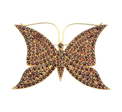 Monumentální motýl s granáty