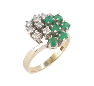 Zlatý prsten s diamanty a smaragdy