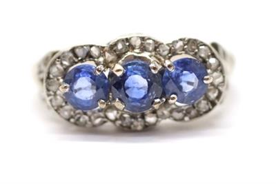 Zlatý prsten s diamanty a safíry