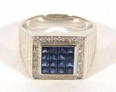 Zlatý prsten s brilianty a safíry