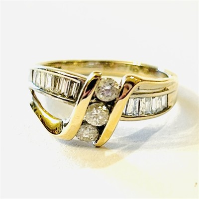 Zlatý prsten s diamanty 0,70 ct