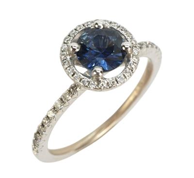 Zlatý prsten s modrým safírem