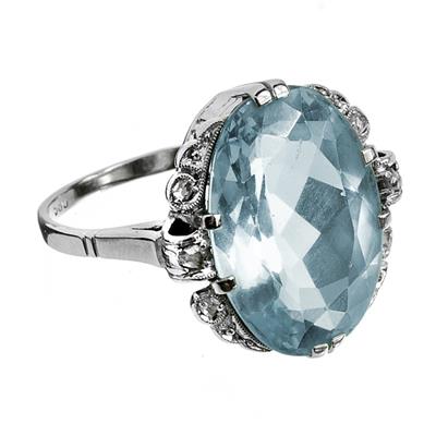 Zlatý prsten s akvamarínem a routami