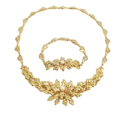 Luxusní zlatá souprava - náhrdelník a náramek, motiv lístků
