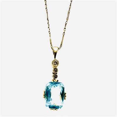 Zlatý závěs s brilianty a modrým kamenem