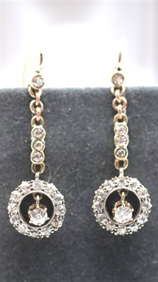 Zlaté náušnice s diamanty