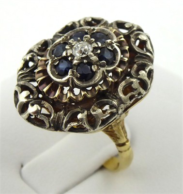 Výrazný prsten s diamantem 0,15 ct a 6 safíry