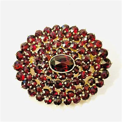 Starožitná stříbrná zlacená brož s českými granáty