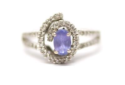 Zlatý prsten s diamanty a tanzanitem