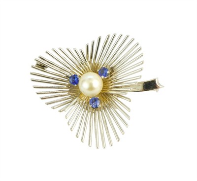 Zlatá brož ve tvaru stylizované květiny