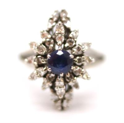 Zlatý prsten s diamanty a safírem