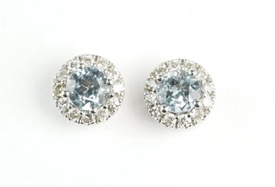 Zlaté náušnice s brilianty a akvamaríny