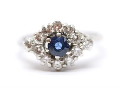 Zlatý prsten s diamanty a safírem