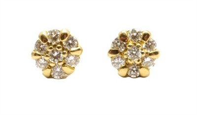 Zlaté náušnice s diamanty