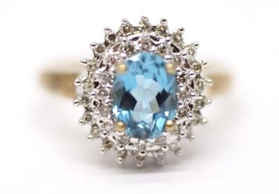 Zlatý prsten s diamanty a topazem