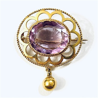 Zlatá starožitná brož s ametystem