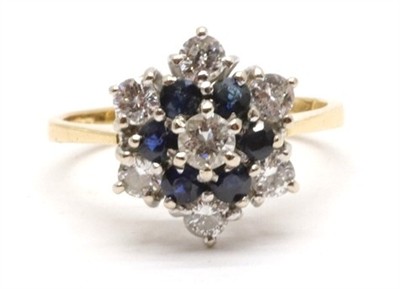Zlatý prsten s diamanty a safíry