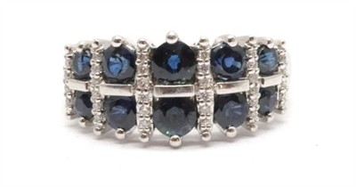 Zlatý prsten s diamanty a safíry