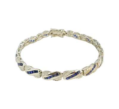 Zlatý článkový náramek s brilianty a safíry