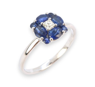Zlatý prsten se safíry a briliantem