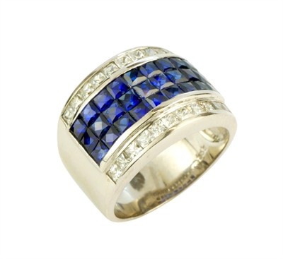 Zlatý prsten s brilianty a safíry