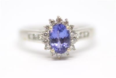 Zlatý prsten s diamanty a tanzanitem