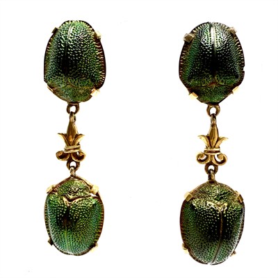 Originální zlaté náušnice s vrubounem posvátným