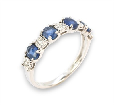 Zlatý prsten se safíry a brilianty