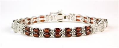 Zlatý náramek s brilianty a granáty