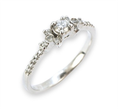 Zlatý prsten s brilianty