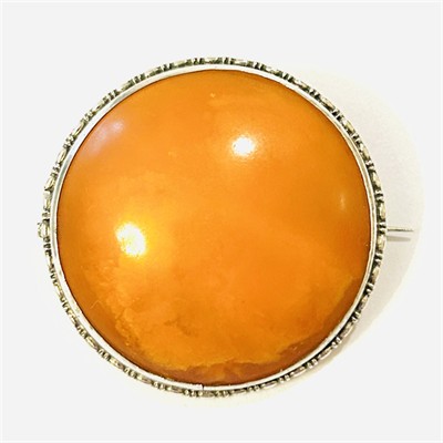 Stříbrná art-deco brož s jantarem