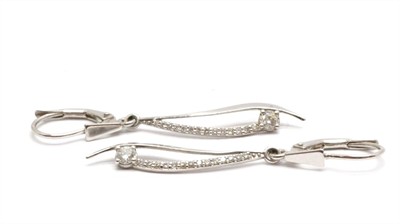 Zlaté náušnice s diamanty