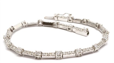 Zlatý náramek s diamanty