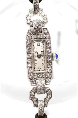 Platinové dámské hodinky s diamanty