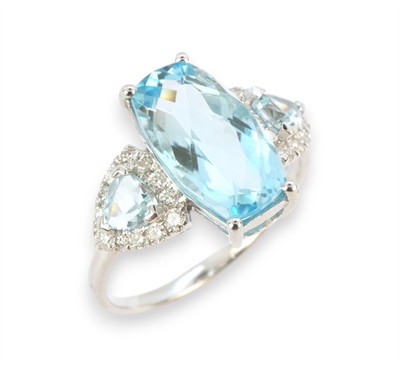 Zlatý prsten s topazy a diamanty