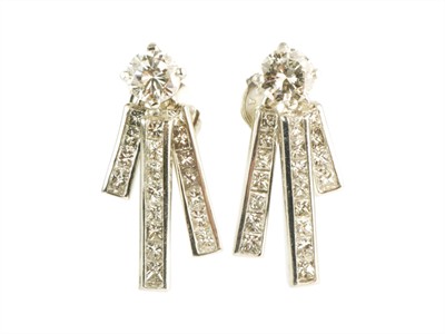 Zlaté náušnice s brilianty