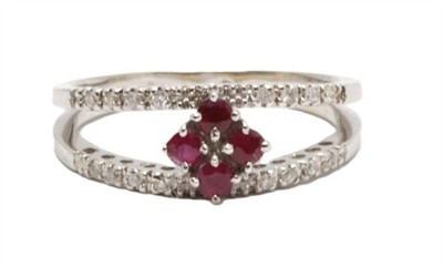 Zlatý prsten s diamanty a rubíny