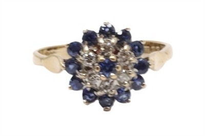 Zlatý prsten s diamanty a safíry