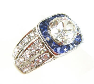 Platinový prsten s brilianty a safíry