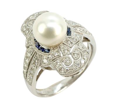 Zlatý prsten s diamanty, modrými safíry a perlou