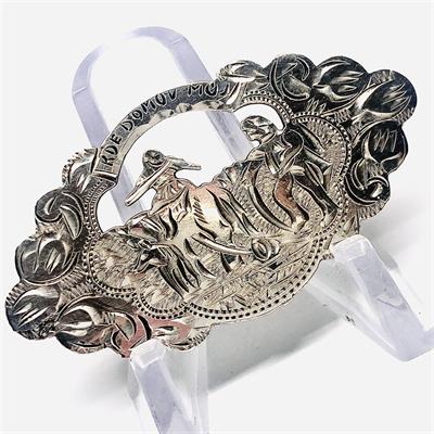 Stříbrná autorská brož