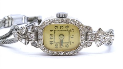 Platinové dámské hodinky s diamanty